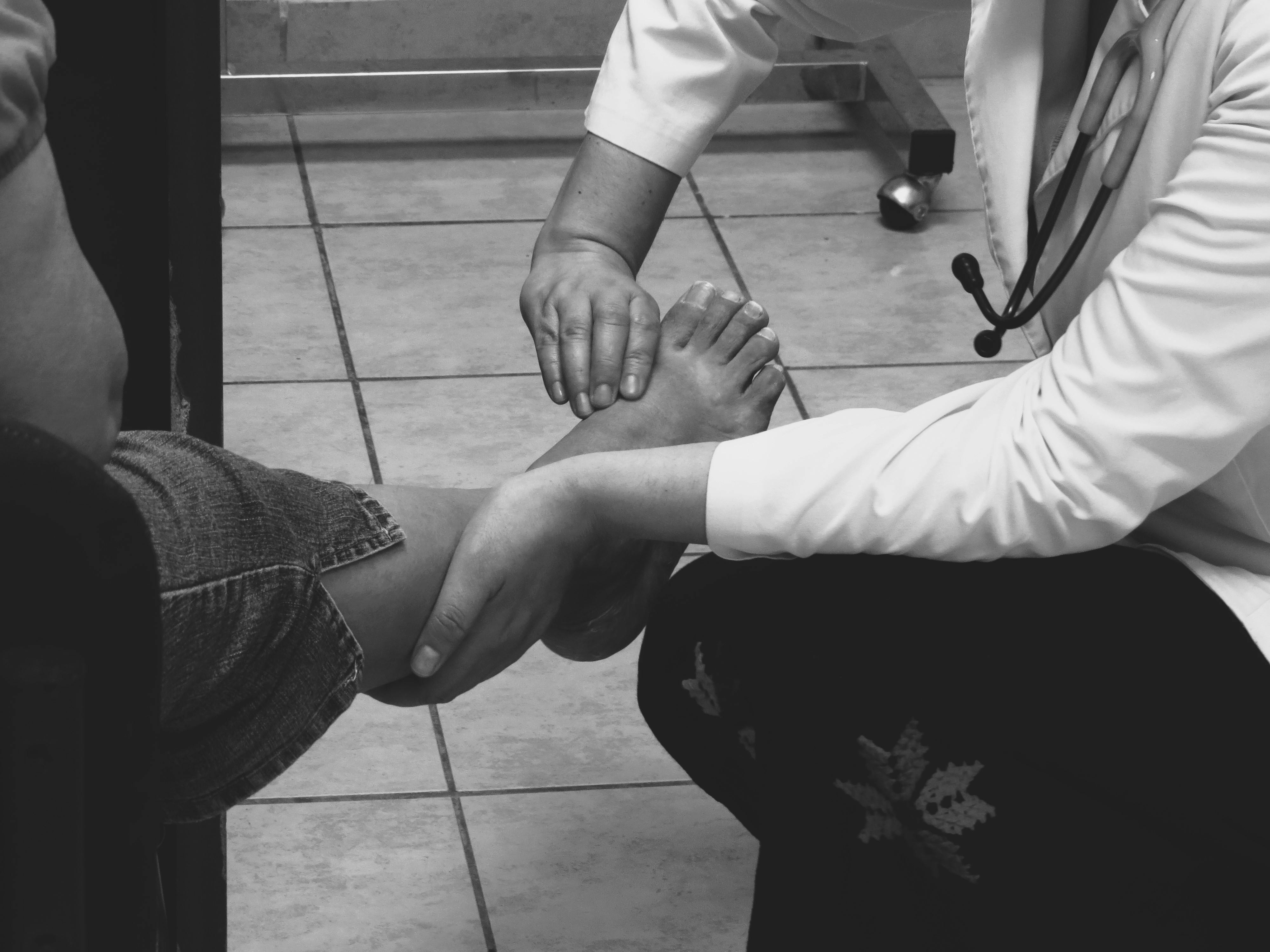 Foot exam image representing burning neuropathy pain